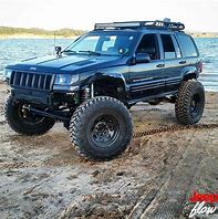 Image result for Jacked Up Jeep Cherokee