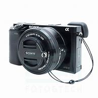 Image result for Lens Cap Sony A7000