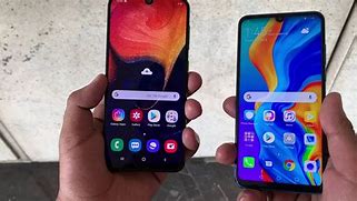 Image result for Samsung A50 vs Huawei P30 Lite