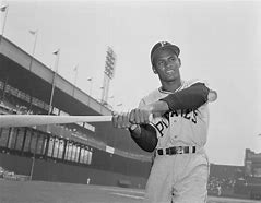 Image result for Roberto Clemente Hitiing Baseball