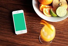 Image result for iPhone SE Orange Unboxing