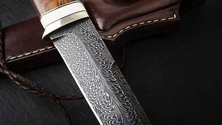 Image result for Camilla Holding Damascus Steel Knife