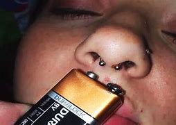 Image result for 9 Volt Battery On Nose Ring