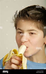 Image result for Boy Eating a Banana