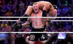Image result for Brock Lesnar Beats Undertaker