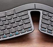 Image result for Apple Ergonomic Keyboard