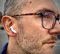 Image result for Person with Air Pods in Ears