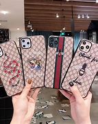 Image result for iPhone 11 Gucci Wallet Phone Case