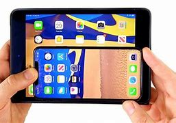 Image result for iPad Mini Size vs iPhone XS