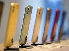 Image result for iPhone 7 Plus Smartphone Is Displayed at an Apple Inc