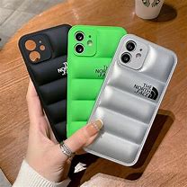 Image result for Smal iPhone in Big Case