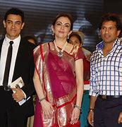 Image result for Nita Ambani Hold Up by Cricketer