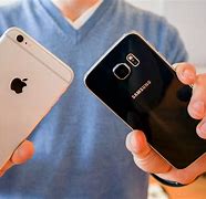 Image result for Samsung Galaxy S4 vs iPhone 6 Plus