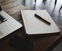 Image result for iPhone On Desk Table Top View