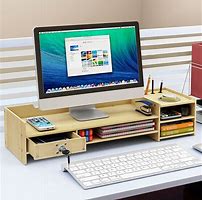 Image result for Emporio Using Computer Stand