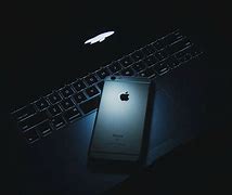 Image result for iPhone 16 Dark Gold