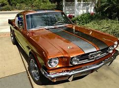 Image result for Orange 65 Mustang Coupe