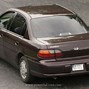 Image result for Red 1997 Chevy Malibu
