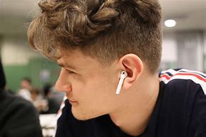 Image result for Person Wearing Apple EarPods