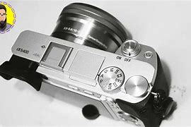 Image result for Old Silver Sony Camera