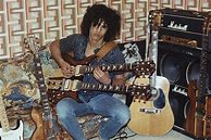 Image result for Young Slash with Guitar