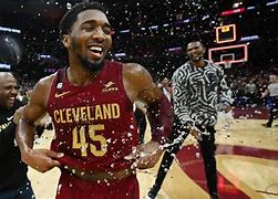 Image result for Donovan Mitchell Dunking Cavs