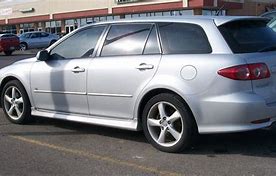 Image result for White Mazda 2003