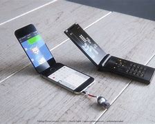 Image result for iPhone 3 Next to Two Flip Phones
