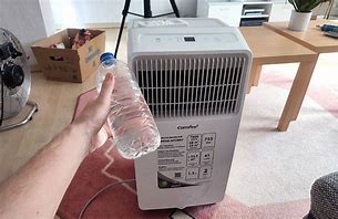 Image result for Portable Air Conditioner Filling with Water