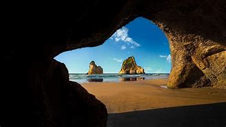 Image result for Windows Lock Screen Beach Cave 10 Photos