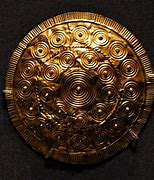 Image result for Gold Sun Disc