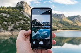 Image result for Holding iPhone Camera