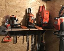 Image result for Enclosed Trailer Chainsaw Holder