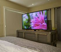Image result for Bed with TV Stand Built In