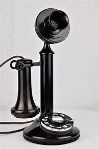 Image result for Antique Wall Mounted Candlestick Telephone