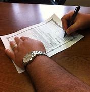 Image result for Modern Photo of a Man Signing a Contract