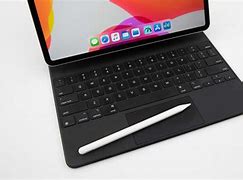 Image result for iPad with Keyboard and Pen