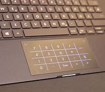 Image result for Touchpad to Right of Keyboard Laptop
