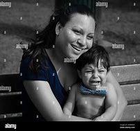 Image result for Image of a Mother Husing a Crying Baby