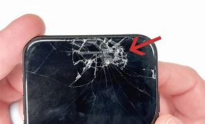 Image result for Holding Cracked iPhone