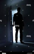 Image result for Man Standing in the Dark