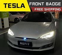 Image result for Tesla Logo Light