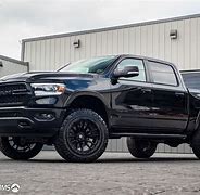 Image result for Black Ram 1500 Lifted