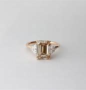 Image result for Emerald Cut Engagement Rings Champagne Diamond