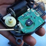 Image result for Charge Port Door Actuator