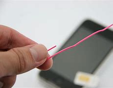 Image result for How to Take Out Sim Card From iPhone 13