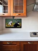 Image result for Under Cabinet Flip Down TV for Kitchen