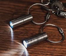 Image result for Multitasking Keychain Flashlight