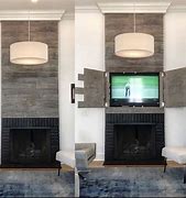 Image result for Hidden TV above Fireplace