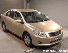 Image result for Toyota Corolla Beige 2010